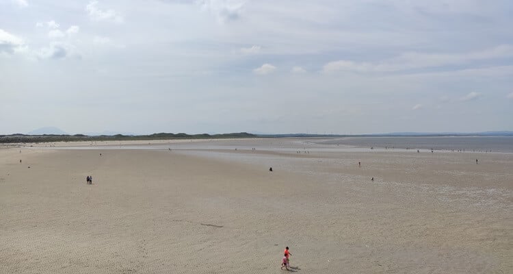 Enniscrone Beach People walking on Enniscrone Beach on a summer's day